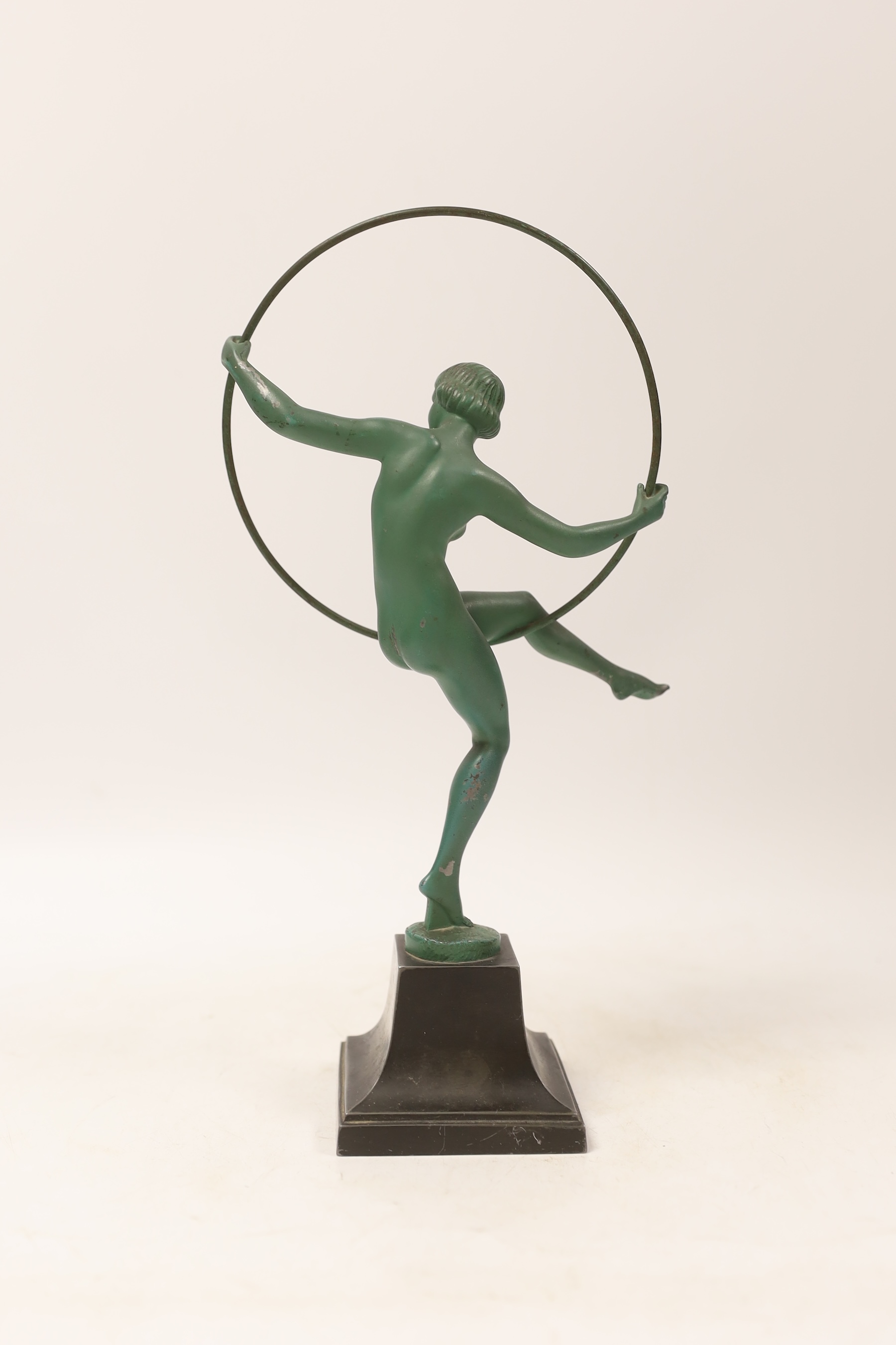 An Art Deco spelter model of a hoop dancer, signed Briand, 29cm. Condition - fair to good